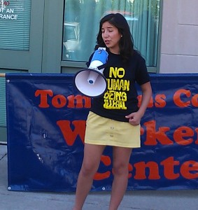 Jessica Perez, Senior Cornell Student in Psychology and Latin American Studies, speaks to a rally of over 50 people in front of Tompkins County Hearings on Living Wages: all very appropriate considering it was International Workers Day!