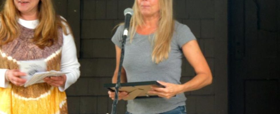 Christine Johnson receiving the Mother Jones Award as presented by UAW Local President, Terry Sharpe.