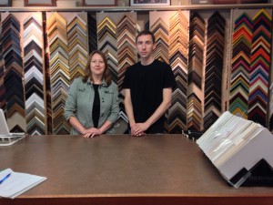 The Frame Shop owner, Emily Russell, on left, with employee, Will King, on right.
